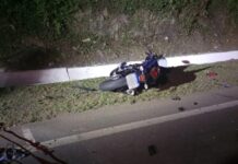 motociclista perna