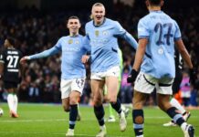 Jogador do City, Haland, comemorando gol com a equipe
