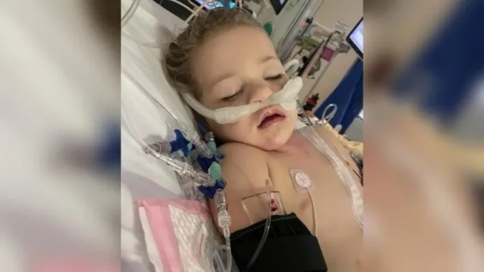Na foto, a menina que engoliu os ímas