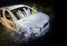 Policiais resgatam motorista de carro em chamas