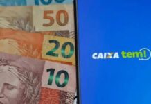 foto mostra aplicativo do caixa tem com cédulas de dinheiro