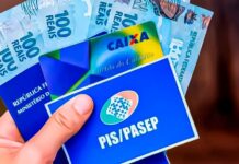 Imagem: de carteira de trabalho e cédulas de dinheiro