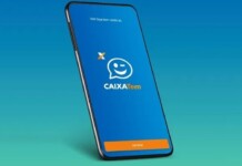 Imagem de um celular com o app do Caixa Tem aberto
