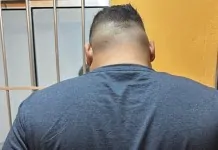 na foto, falso pai de santo