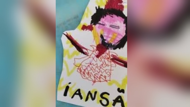 o desenho que a criança fez em escola