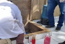 na foto, fiscalização em funerária interditada