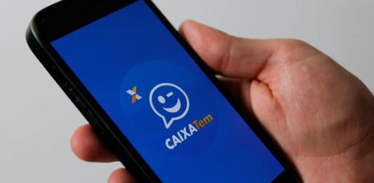 Caixa desmente pagamento de indenização de R$ 15 mil pelo Caixa Tem e alerta usuários sobre golpe nas redes sociais.